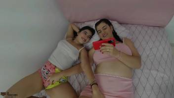 Bisexual stepsisters get horny watching a lesbian video FULL STORY